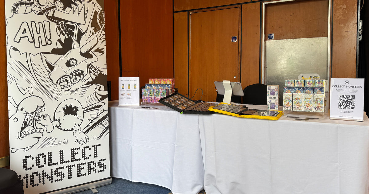 Collect Monsters banner beside a card-show table
